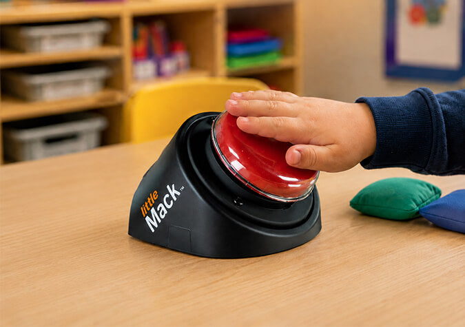 LITTLEmack communication device pressed by child