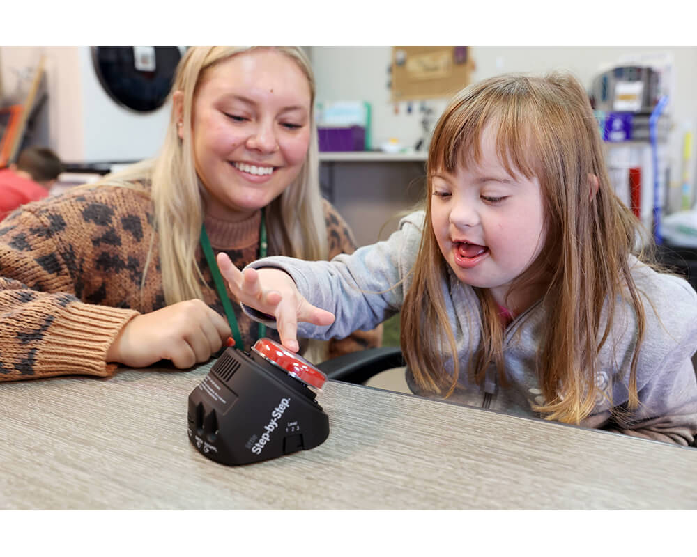 LITTLE Step-by-Step communicator with coloured button top used in classroom
